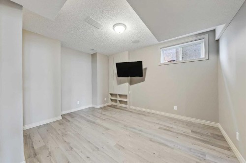 169 Cove Road, Chestermere, AB - Indoor Photo Showing Other Room