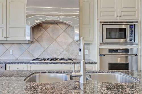 169 Cove Road, Chestermere, AB - Indoor Photo Showing Kitchen With Stainless Steel Kitchen With Double Sink With Upgraded Kitchen