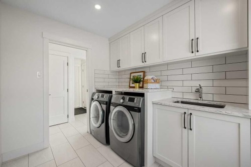 456 Wilderness Drive Se, Calgary, AB - Indoor Photo Showing Laundry Room