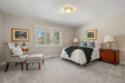 456 Wilderness Drive Se, Calgary, AB - Indoor Photo Showing Bedroom