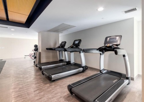 1607-1122 3 Street Se, Calgary, AB - Indoor Photo Showing Gym Room