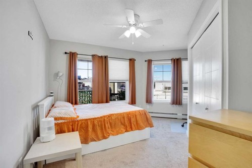208-402 Marquis Lane Se, Calgary, AB - Indoor Photo Showing Bedroom