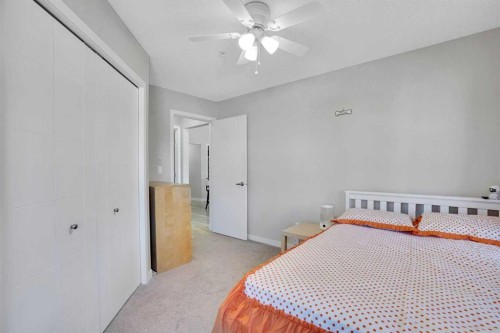 208-402 Marquis Lane Se, Calgary, AB - Indoor Photo Showing Bedroom