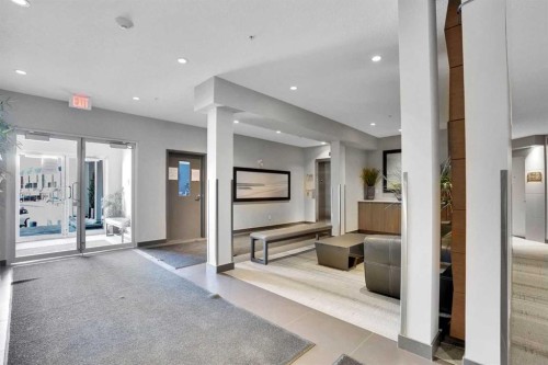 208-402 Marquis Lane Se, Calgary, AB - Indoor Photo Showing Other Room