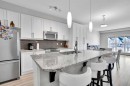 208-402 Marquis Lane Se, Calgary, AB  - Indoor Photo Showing Kitchen With Stainless Steel Kitchen With Upgraded Kitchen 