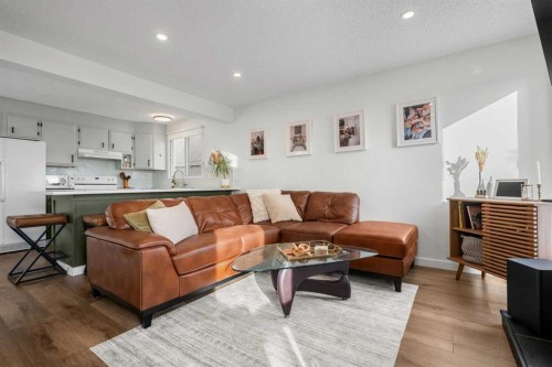 55 Coach Gate Way Sw, Calgary, AB - Indoor Photo Showing Living Room