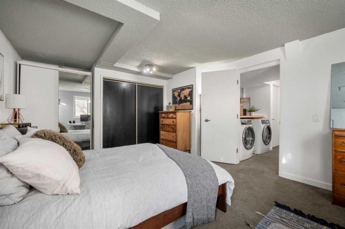 55 Coach Gate Way Sw, Calgary, AB - Indoor Photo Showing Bedroom