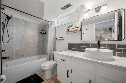 55 Coach Gate Way Sw, Calgary, AB - Indoor Photo Showing Bathroom