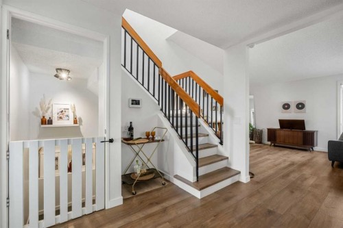 55 Coach Gate Way Sw, Calgary, AB - Indoor Photo Showing Other Room