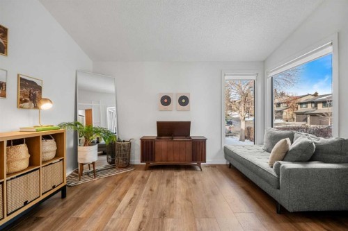 55 Coach Gate Way Sw, Calgary, AB - Indoor Photo Showing Living Room