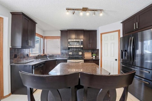 263 Coral Keys Drive Ne, Calgary, AB - Indoor Photo Showing Kitchen With Stainless Steel Kitchen