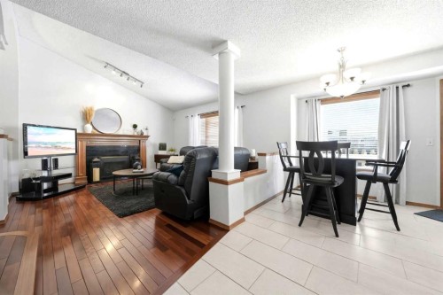 263 Coral Keys Drive Ne, Calgary, AB - Indoor With Fireplace