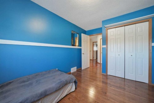 263 Coral Keys Drive Ne, Calgary, AB - Indoor Photo Showing Bedroom