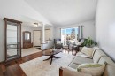 263 Coral Keys Drive Ne, Calgary, AB  - Indoor Photo Showing Living Room 