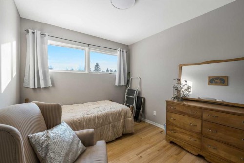126 Springwood Drive Sw, Calgary, AB - Indoor Photo Showing Bedroom