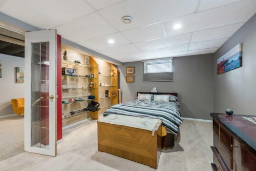 126 Springwood Drive Sw, Calgary, AB - Indoor Photo Showing Bedroom