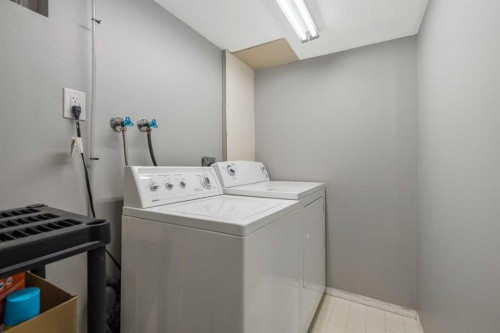 126 Springwood Drive Sw, Calgary, AB - Indoor Photo Showing Laundry Room