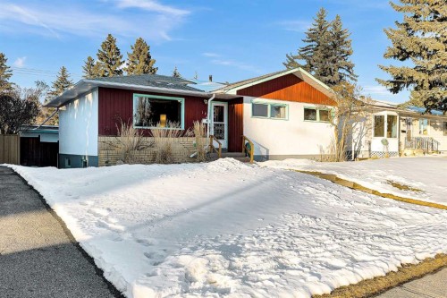 126 Springwood Drive Sw, Calgary, AB - Outdoor With Facade