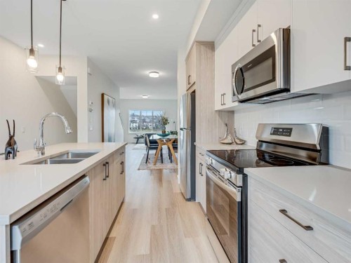 2221 81St Street Sw, Calgary, AB - Indoor Photo Showing Kitchen With Double Sink With Upgraded Kitchen
