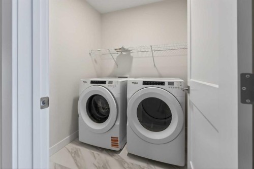 159 Greenwich Drive Nw, Calgary, AB - Indoor Photo Showing Laundry Room