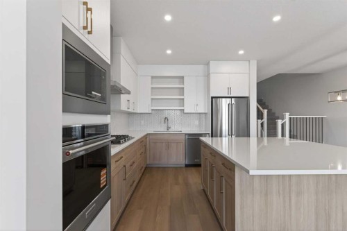 159 Greenwich Drive Nw, Calgary, AB - Indoor Photo Showing Kitchen With Stainless Steel Kitchen With Upgraded Kitchen