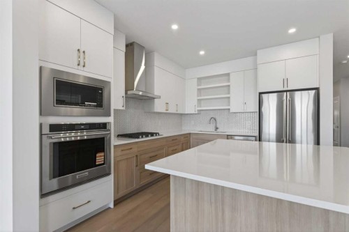 159 Greenwich Drive Nw, Calgary, AB - Indoor Photo Showing Kitchen With Stainless Steel Kitchen With Upgraded Kitchen