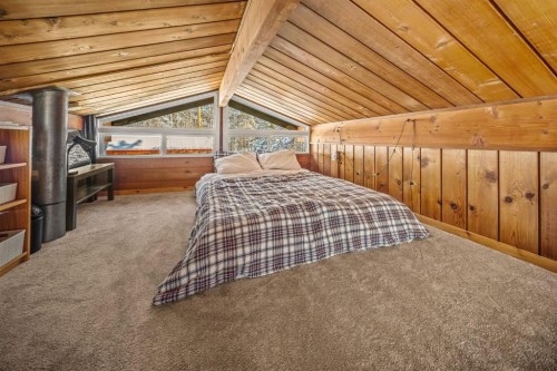 126 Elk Street, Harvie Heights, AB - Indoor Photo Showing Bedroom