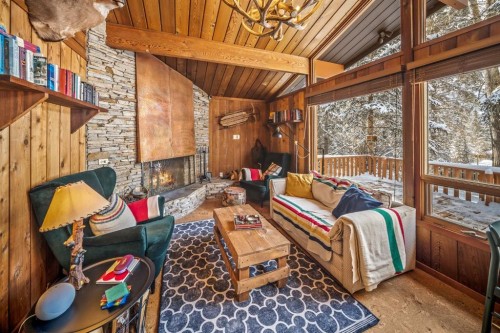 126 Elk Street, Harvie Heights, AB - Indoor With Fireplace