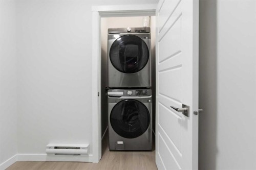 8 Heartwood Lane Se, Calgary, AB - Indoor Photo Showing Laundry Room