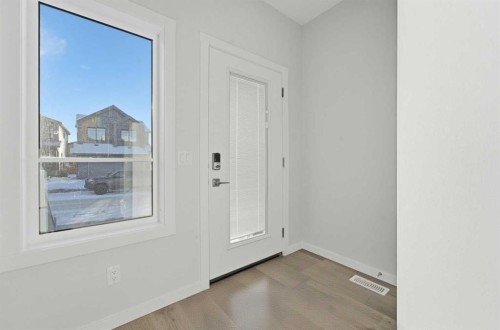 8 Heartwood Lane Se, Calgary, AB - Indoor Photo Showing Other Room