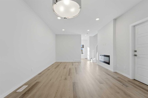 8 Heartwood Lane Se, Calgary, AB - Indoor Photo Showing Other Room