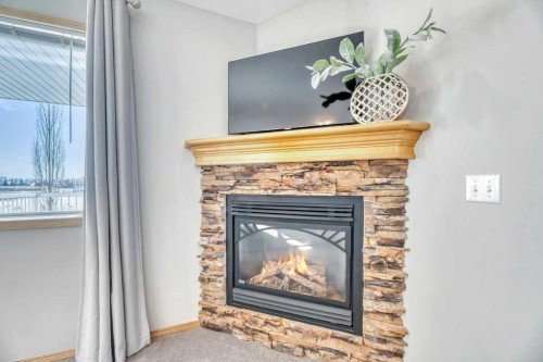 133 Parklane Drive, Strathmore, AB - Indoor Photo Showing Living Room With Fireplace