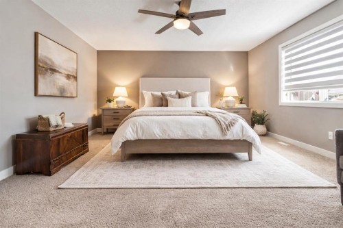 21 Riviera Point, Cochrane, AB - Indoor Photo Showing Bedroom