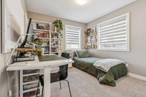 21 Riviera Point, Cochrane, AB - Indoor Photo Showing Bedroom