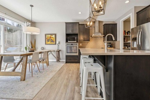 21 Riviera Point, Cochrane, AB - Indoor Photo Showing Kitchen With Upgraded Kitchen