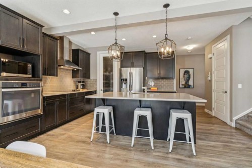 21 Riviera Point, Cochrane, AB - Indoor Photo Showing Kitchen With Upgraded Kitchen