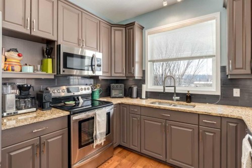 310-2134 Kensington Road Nw, Calgary, AB - Indoor Photo Showing Kitchen With Double Sink