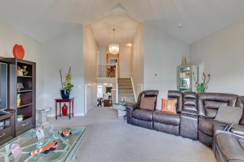 228 Sage Bluff Drive Nw, Calgary, AB - Indoor Photo Showing Living Room