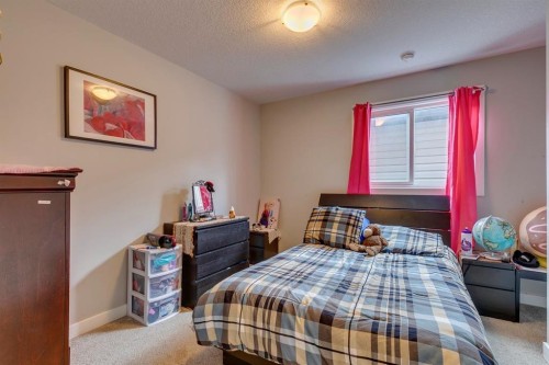228 Sage Bluff Drive Nw, Calgary, AB - Indoor Photo Showing Bedroom