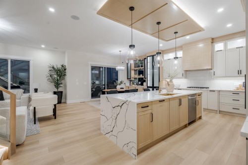 2057 Waterbury Road, Chestermere, AB - Indoor Photo Showing Kitchen With Upgraded Kitchen
