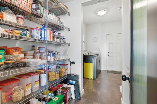 238 Sunset View, Cochrane, AB - Indoor Photo Showing Other Room