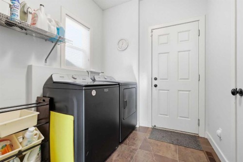 238 Sunset View, Cochrane, AB - Indoor Photo Showing Laundry Room