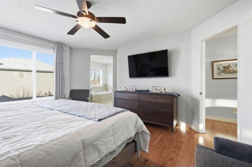 238 Sunset View, Cochrane, AB - Indoor Photo Showing Bedroom