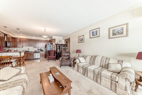 107-1005A Westmount Drive, Strathmore, AB - Indoor Photo Showing Living Room