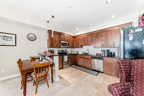 107-1005A Westmount Drive, Strathmore, AB - Indoor Photo Showing Kitchen