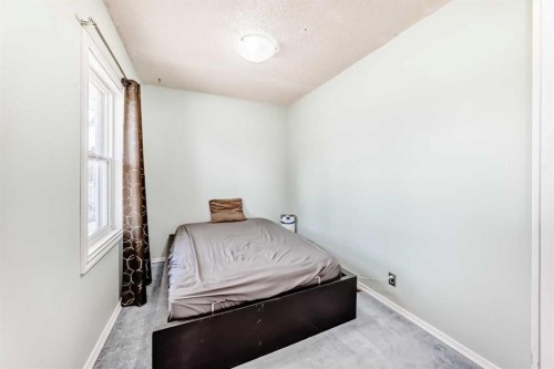 3 Cochrane Lake Trail, Cochrane Lake, AB - Indoor Photo Showing Bedroom