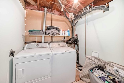 3 Cochrane Lake Trail, Cochrane Lake, AB - Indoor Photo Showing Laundry Room