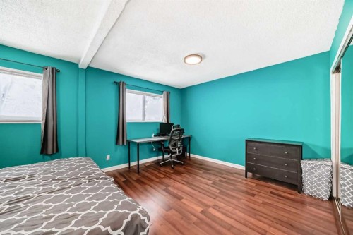 644 Spring Haven Court Se, Airdrie, AB - Indoor Photo Showing Bedroom
