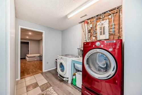 644 Spring Haven Court Se, Airdrie, AB - Indoor Photo Showing Laundry Room
