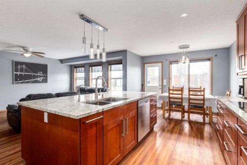 191 Panamount Heights Nw, Calgary, AB - Indoor Photo Showing Kitchen With Double Sink